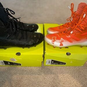 2 pairs of Like New Under Armour Cleats 1 Black and 1 Orange
